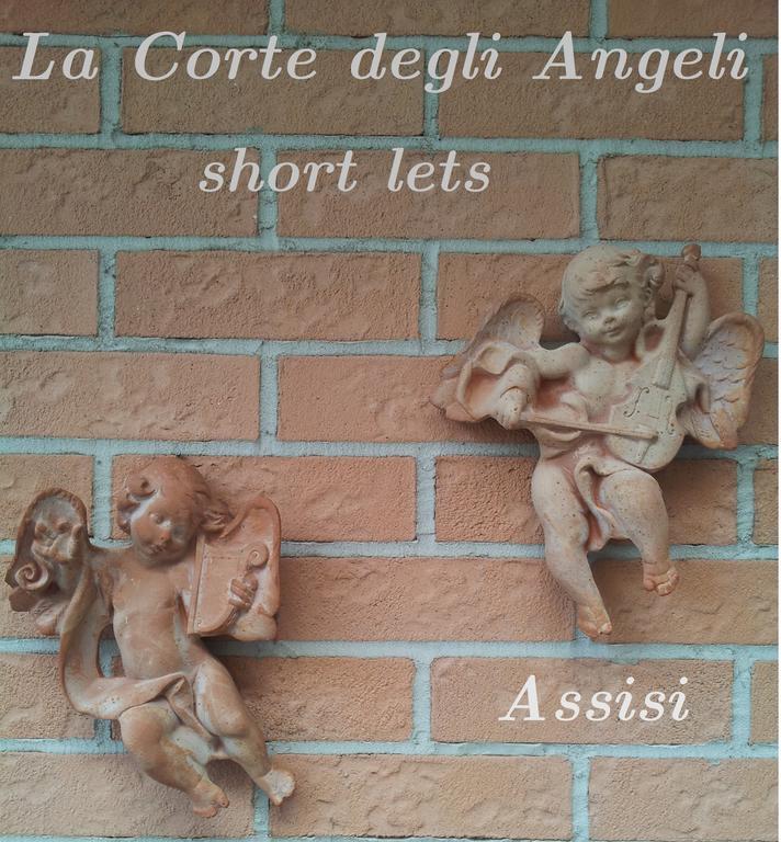 La Corte Degli Angeli Locazioni Turistiche Ассизи Номер фото
